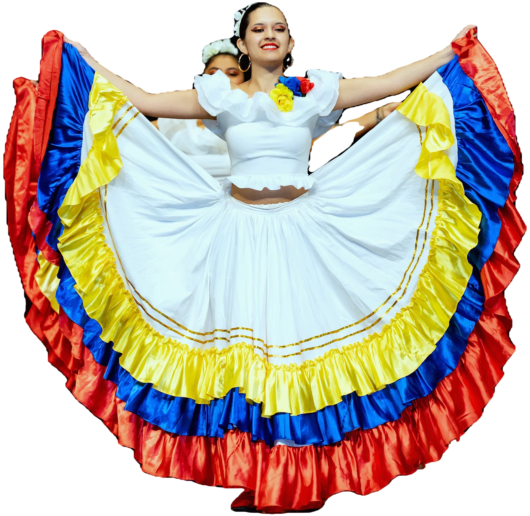 A CDG dancer fans out her flag-coloured pollera.