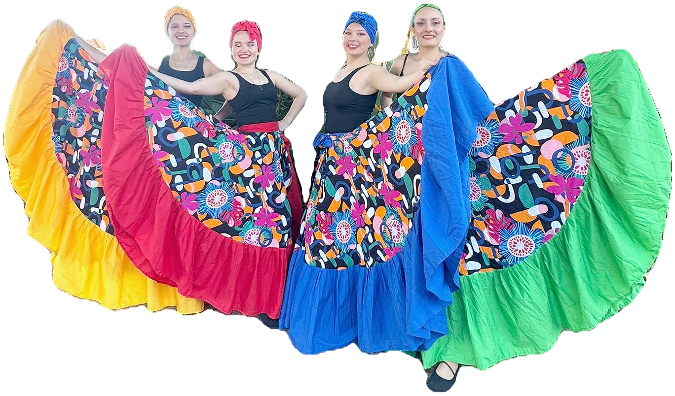 Four CDG dancers fan their yellow, red, blue and green Son de Negro skirts.